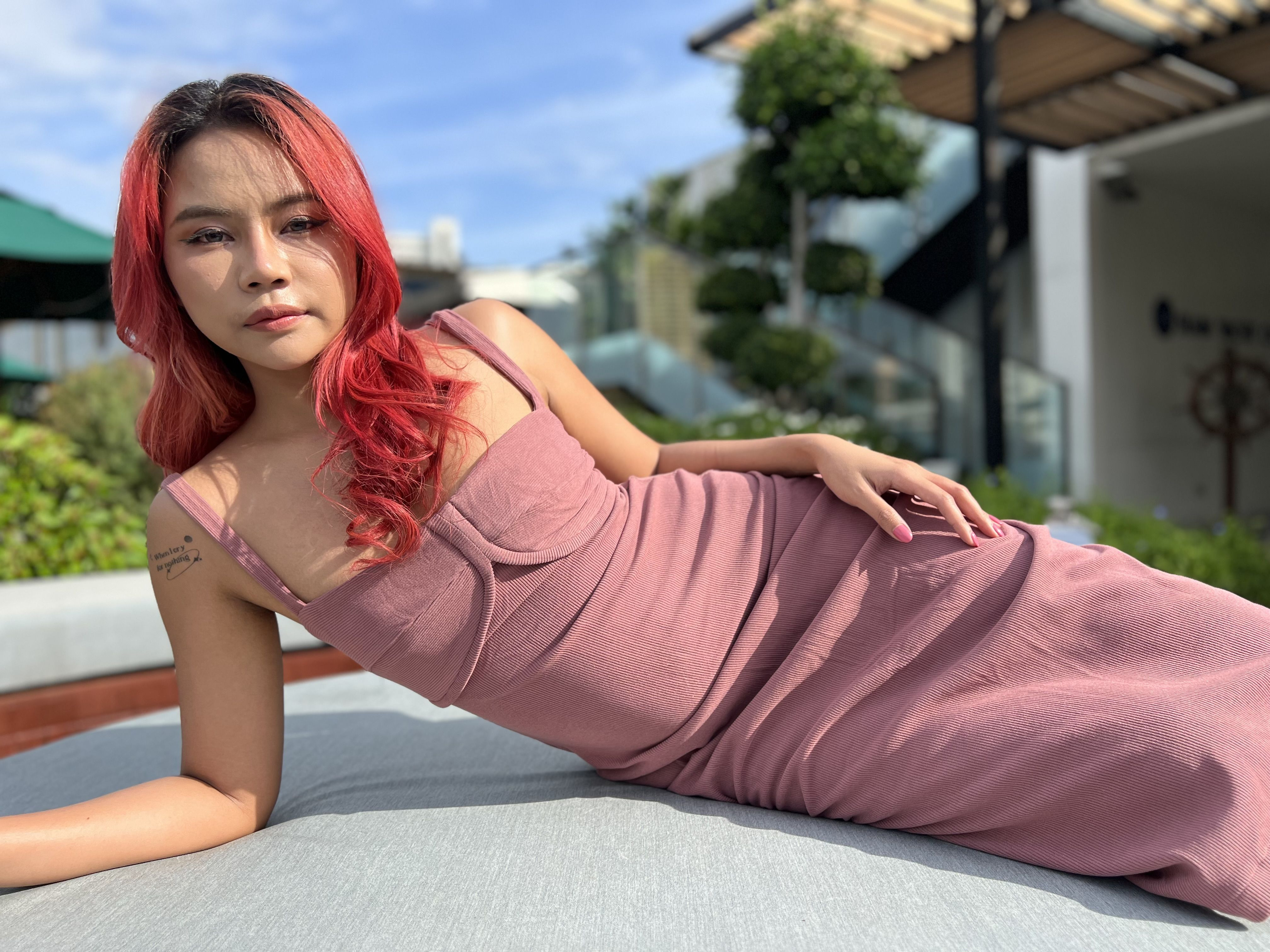 Thai student with red hair loves modeling and tourists Slideshow