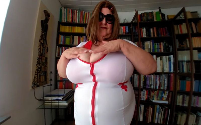 Maja in: The Busty Nurse Strip - Huge Tits BBW Solo Slideshow