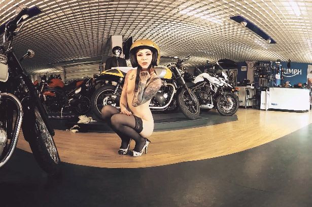 Sexy Redhead Foxy Saine is Ready to Ride - Biker Babe Tattoos Model Slideshow